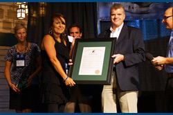 Accepting the award, Turbo President, Pier Veilleux and Esther Morissette, VP of Marketing and PR The IMG Partner Member of the Year was presented to Pier Veilleux and Esther Morissette with Turbo Images