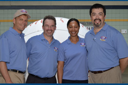 (L-R) Mike Dickson (SES President), Fran Walsh (Lancer Insurance VP of Passenger Transportation Underwriting), Lethia Rose (Lancer Insurance underwriter) and Brian Parker (SES Director of Development). (L-R) Mike Dickson (SES President), Fran Walsh (Lancer Insurance VP of Passenger Transportation Underwriting), Lethia Rose (Lancer Insurance underwriter) and Brian Parker (SES Director of Development).