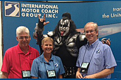 (L-R) Arrow Stage Lines VP of Sales/South Regional Director Chuck Gunnels, IMG President, Bronwyn Wilson, Escot Bus Lines Sales & Marketing Director with KISS im(L-R) Arrow Stage Lines VP of Sales/South Regional Director Chuck Gunnels, IMG President, Bronwyn Wilson, Escot Bus Lines Sales & Marketing Director with KISS impersonator (L-R) Arrow Stage Lines VP of Sales/South Regional Director Chuck Gunnels, IMG President, Bronwyn Wilson, Escot Bus Lines Sales & Marketing Director with KISS impersonator.